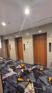 Fotografie z fotogalerie ubytování فندق الطلائع الذهبي v destinaci Az Zahrāʼ