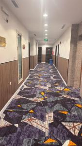 Fotografie z fotogalerie ubytování فندق الطلائع الذهبي v destinaci Az Zahrāʼ