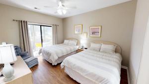 Postel nebo postele na pokoji v ubytování Club Villas Unit 19C - Lower Level + 7 fotografií