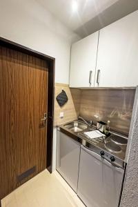 Η κουζίνα ή μικρή κουζίνα στο Apartment Am Hohen Bogen-38 by Interhome