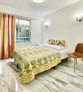 Ένα ή περισσότερα κρεβάτια σε δωμάτιο στο Beach and Sea View