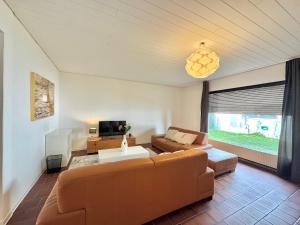 TV a/nebo společenská místnost v ubytování Villa Heusenstamm