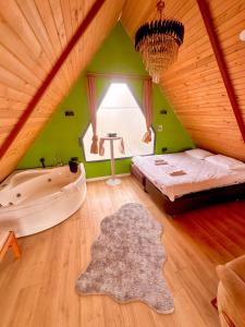 Postel nebo postele na pokoji v ubytování Bigados Bungalov