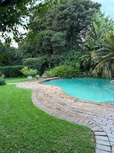 Bazén v ubytování Jardin Villa nebo v jeho okolí