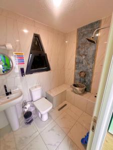 Koupelna v ubytování Bigados Bungalov + 10 fotografií