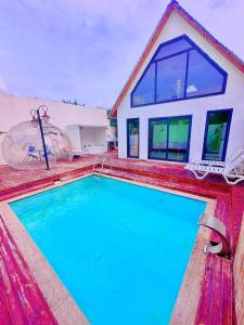 Bazén v ubytování Bigados Bungalov nebo v jeho okolí