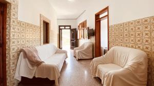 En eller flere senge i et værelse på Vista Pino