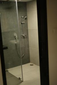 Ένα μπάνιο στο Kriya Grandeur Hotel