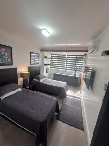 Postel nebo postele na pokoji v ubytování Oceanview Frente Mar 130m2