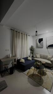 Posezení v ubytování Small Loft of Indah Living