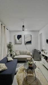 Posezení v ubytování Small Loft of Indah Living + 10 fotografií