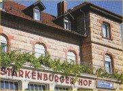 un edificio de ladrillo rojo con aurger no firmado en él en Hotel Starkenburger Hof, en Heppenheim an der Bergstrasse