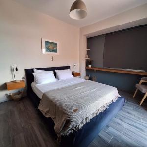 Кровать или кровати в номере Aqua Two Storey House +39 фотографий