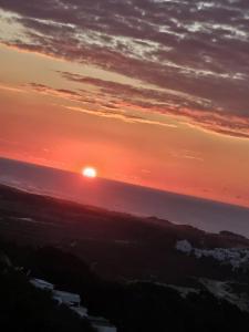 a sunset from the top of a mountain at Appartement Madeleine Uniquement les familles in Oualidia