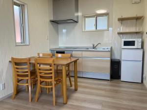 Kuchyň nebo kuchyňský kout v ubytování 富士晴 湖畔 Villas 湖景