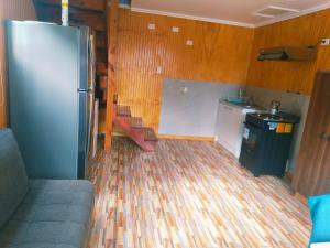 Kuchyň nebo kuchyňský kout v ubytování Cabaña nely + 2 fotografie