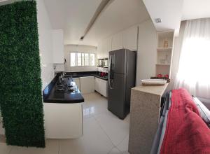 Η κουζίνα ή μικρή κουζίνα στο Apartamento 2 quartos vila velha Edifício Jacaranda 101