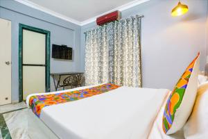 Una cama o camas en una habitación de Via Nebula Grand