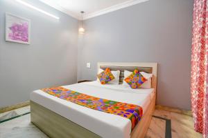 Una cama o camas en una habitación de Via Nebula Grand