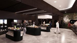 a group of people walking around a buffet line at The Capital Boardwalk in Gqeberha