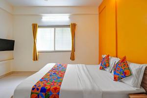 Ένα ή περισσότερα κρεβάτια σε δωμάτιο στο Via Arrow Residency +17 φωτογραφίες