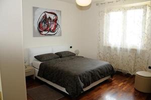 Postel nebo postele na pokoji v ubytování Villa Panoramica