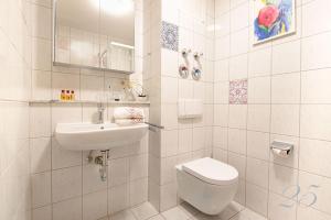 Ένα μπάνιο στο Appartement Mit Balkon +3 φωτογραφίες