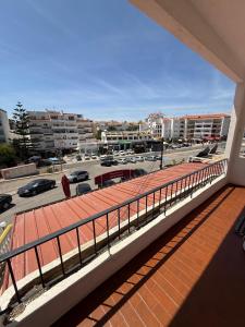 a balcony with a view of a parking lot at Costa Mar by Albufeira Rental in Olhos de Água