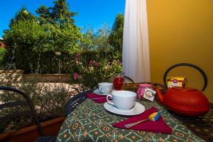 Tiện nghi pha trà/cà phê tại Bilocale Alborense +7 ảnh