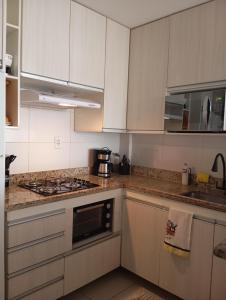 Η κουζίνα ή μικρή κουζίνα στο Beira-mar