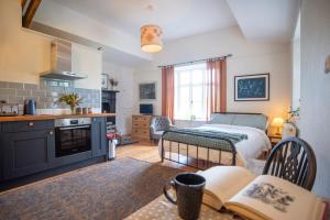 Køkken eller tekøkken på The Coachmans Quarters