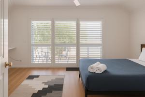 Postel nebo postele na pokoji v ubytování Beach Casa