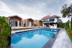 Bazén v ubytování Floresta Farm & Resort nebo v jeho okolí