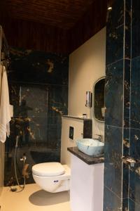 Koupelna v ubytování Floresta Farm & Resort + 9 fotografií