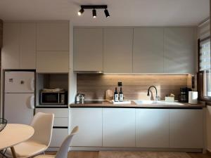 Η κουζίνα ή μικρή κουζίνα στο The Callistone House