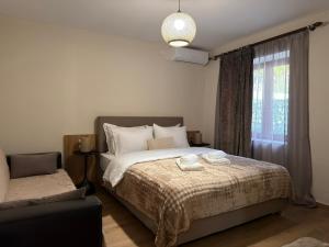 Ένα ή περισσότερα κρεβάτια σε δωμάτιο στο The Callistone House