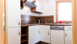 Η κουζίνα ή μικρή κουζίνα στο Zirbe +5 φωτογραφίες