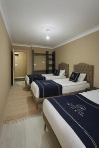 Ένα ή περισσότερα κρεβάτια σε δωμάτιο στο Loft House Studio