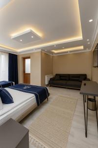 Postel nebo postele na pokoji v ubytování Loft House Studio