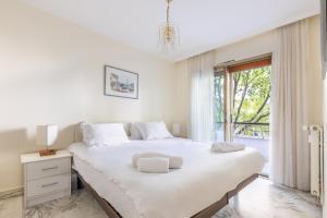 Postel nebo postele na pokoji v ubytování LB Vacation Rentals I Cannes Croisette, Large Terrace, Free Parking, Beaches