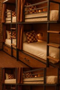 a room with multiple bunk beds with lights on them at Voltage Lodge Collie in Collie
