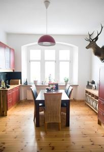 Køkken eller tekøkken på Ferienwohnung Oberförsterei Sosa I