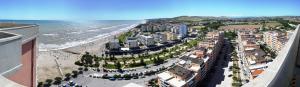 an aerial view of a beach with buildings and the ocean at Skyscraper Porto Sant'Elpidio in Porto SantʼElpidio