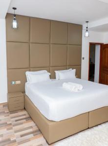 Ένα ή περισσότερα κρεβάτια σε δωμάτιο στο Sofitel Executive 2 bedrooms all ensuite