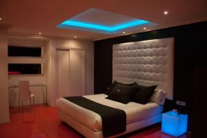 Ένα ή περισσότερα κρεβάτια σε δωμάτιο στο Motel Paraiso