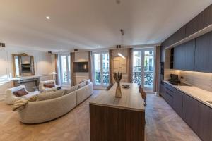 Μια τηλεόραση ή/και κέντρο ψυχαγωγίας στο Architect Luxury Appartment - Marais