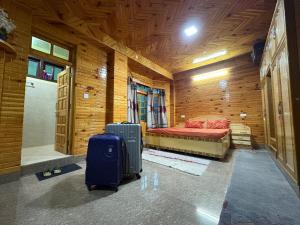 Ένα ή περισσότερα κρεβάτια σε δωμάτιο στο Amritalya Stays