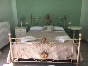 Postel nebo postele na pokoji v ubytování B&B Harmonia