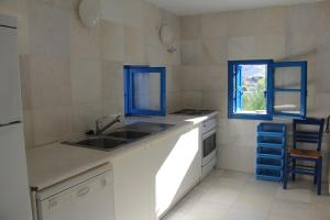 Kuchyň nebo kuchyňský kout v ubytování Artistic Villa + 38 fotografií