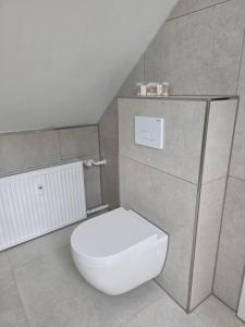 Koupelna v ubytování Monteur-& Ferienwohnung -zentral & gemütlich